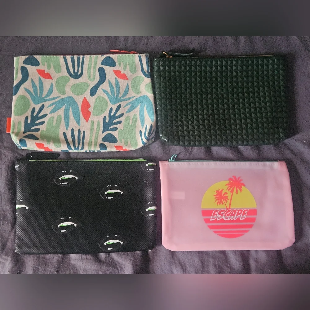 4 ipsy makeup/travel bags